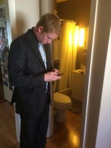 Jack Texting While Coming ouf of the Bathroom