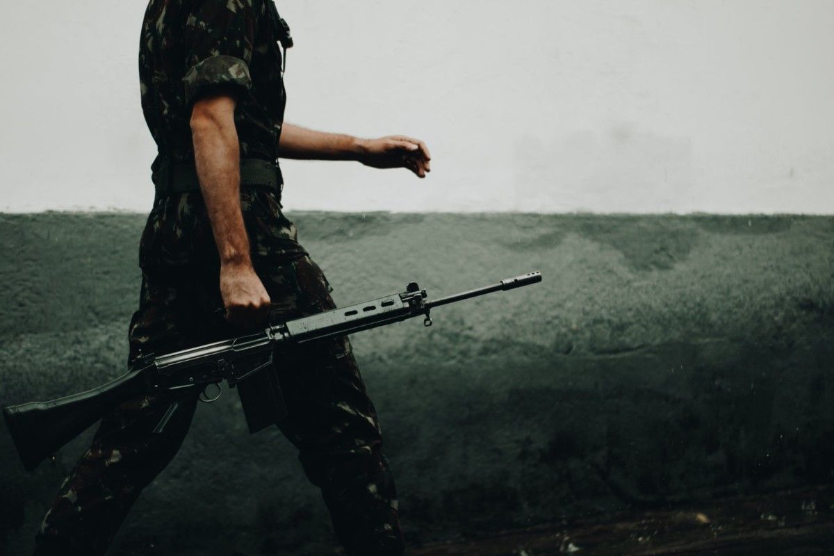 soldier holding gun